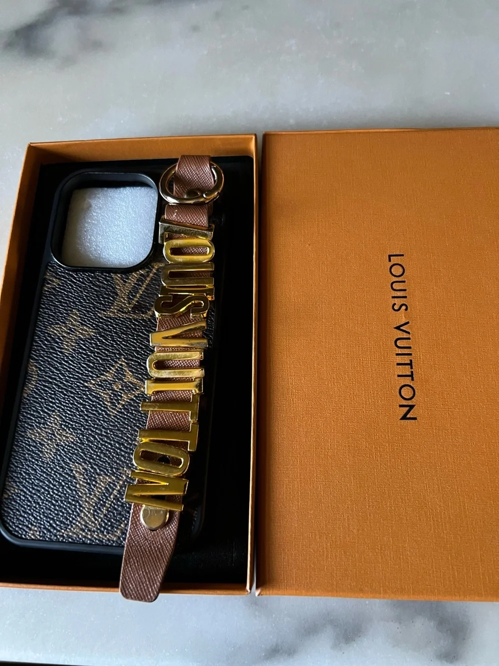 💫 Louis Vuitton Monogram Canvas Phone Case with Gold Letter Strap